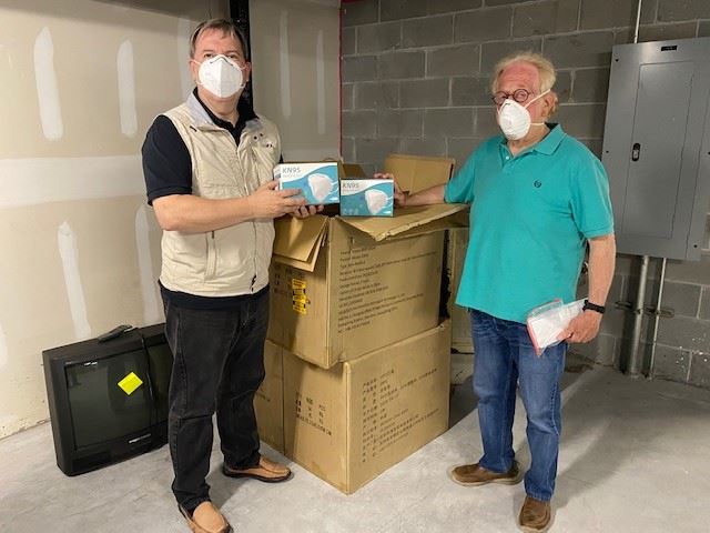 Mayor Billy Keyserling with a member of the International Medical Corps.