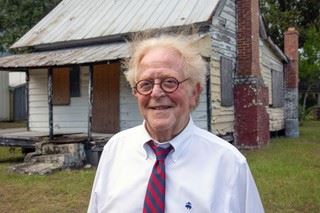 Billy in front of home